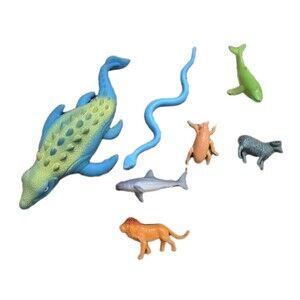 Mixed 7 Toy Figures Animals Dolphin Snake Bug Ram Lion Dinosaur Figurines Toys